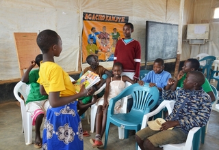  Children aged 10 – 13 in a discussion to share what they’ve learnt after SRH session with a Midwife  