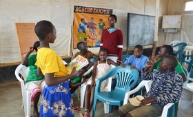  Children aged 10 – 13 in a discussion to share what they’ve learnt after SRH session with a Midwife  