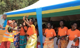 Women in Nyamasheke District celebrating their achievement and the progress in living in a society free of women violence .