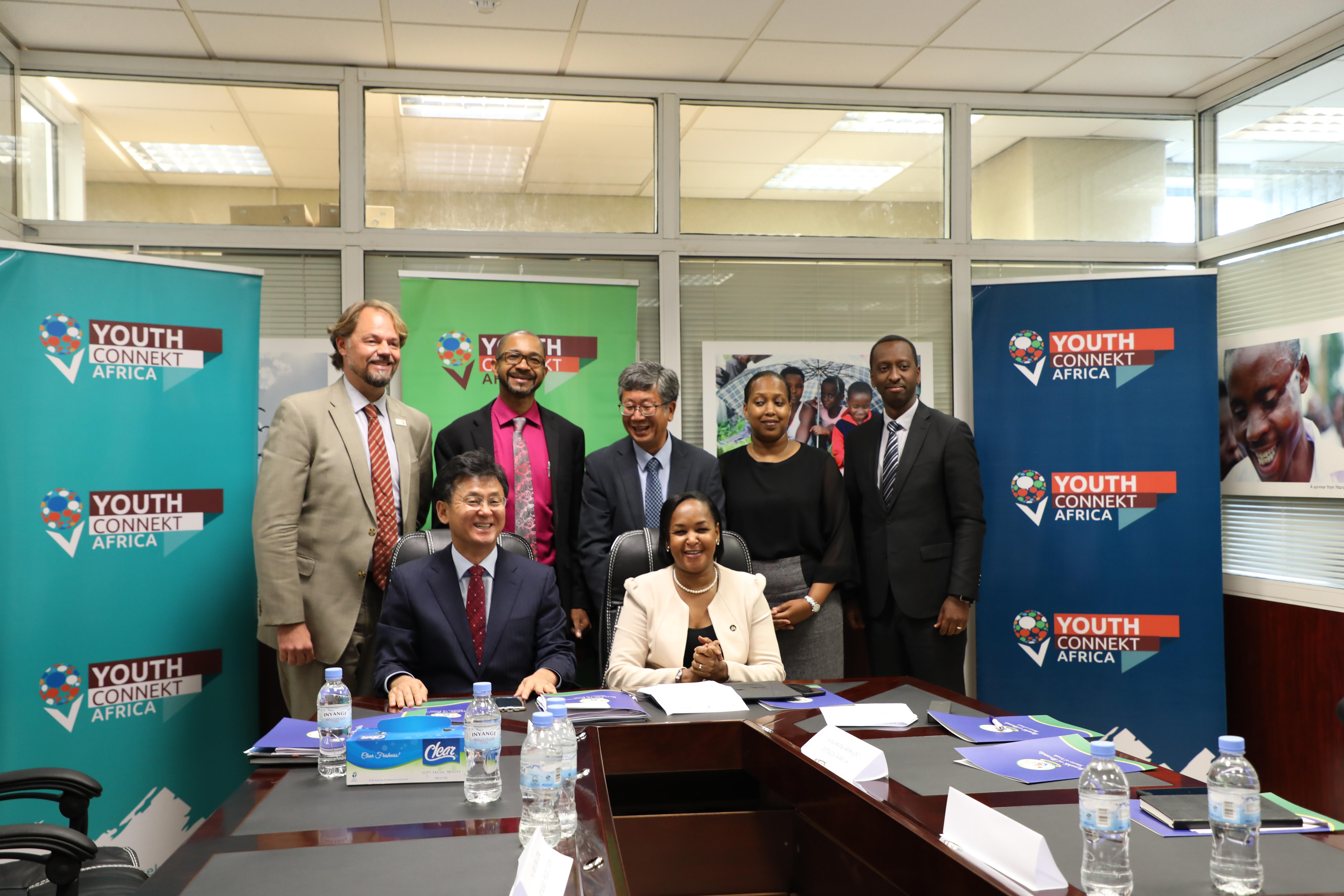 Photo: Front Hon. Rose Mary Mbabazi, Minister of Youth, H.E Amb. Kim Eung-joong, Ambassador of the Republic of Korea. Standing (L– R) Mark Bryan Schreiner, UNFPA Representative, Stephen Rodrigues, UNDP Resident Representative, Mr. Mr. Lee Byung Hwa, KOICA Country Director, Ms. Kampeta Sayinzoga, Director General, National Industrial Research and Development Agency, and Managing Director, Liquid Telecommunications during the signing ceremony