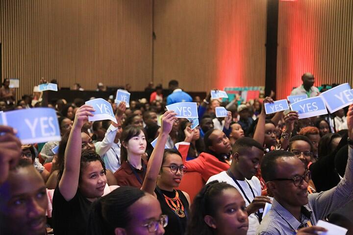 Photo: Young people respond to questions to causes of teenage pregnancy during health session at YCA summit 